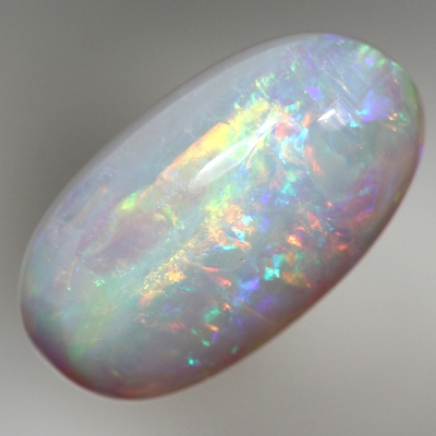 SOLID CRYSTAL OPAL Sparkles of bright orange to green to purple